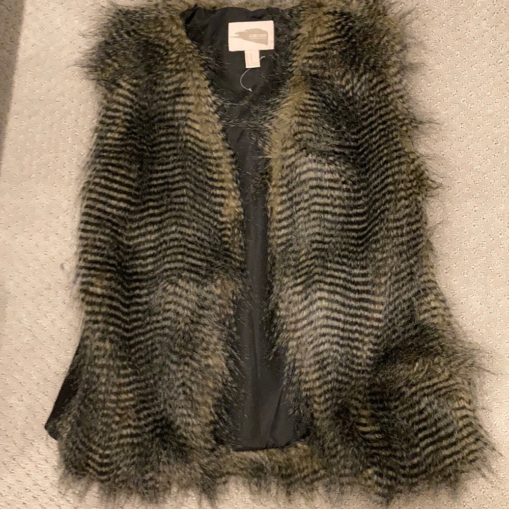 Forever21 faux fur vest. Polyester shell.